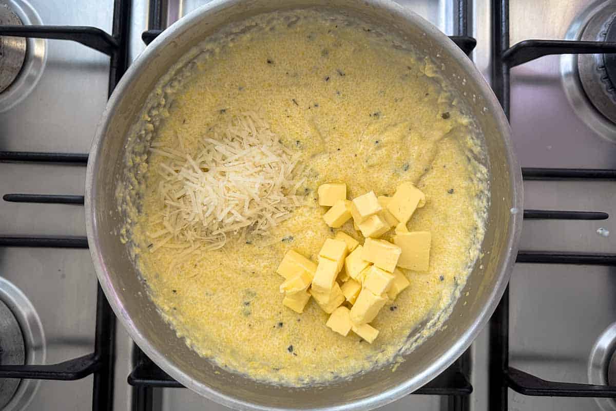Butter and grated parmesan added to cooked polenta for a rich and creamy parmesan polenta finish.