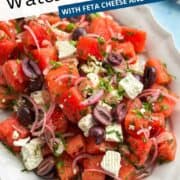 Watermelon salad with feta, olives, and red onions, perfect for summer meals. Fresh, vibrant, and easy.