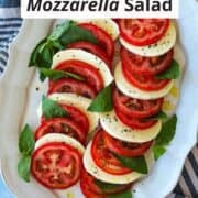 Classic Caprese salad with ripe tomatoes, fresh mozzarella, basil, and olive oil.