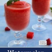 Refreshing watermelon wine slushie with mint and strawberries, perfect for summer drinks.