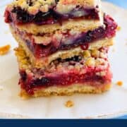 Delicious berry jam crumble bars with a golden crumb topping, perfect for dessert or snack.