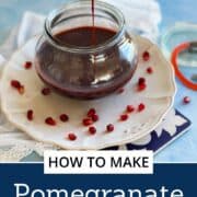 Pomegranate molasses being poured into a jar on a kitchen table.