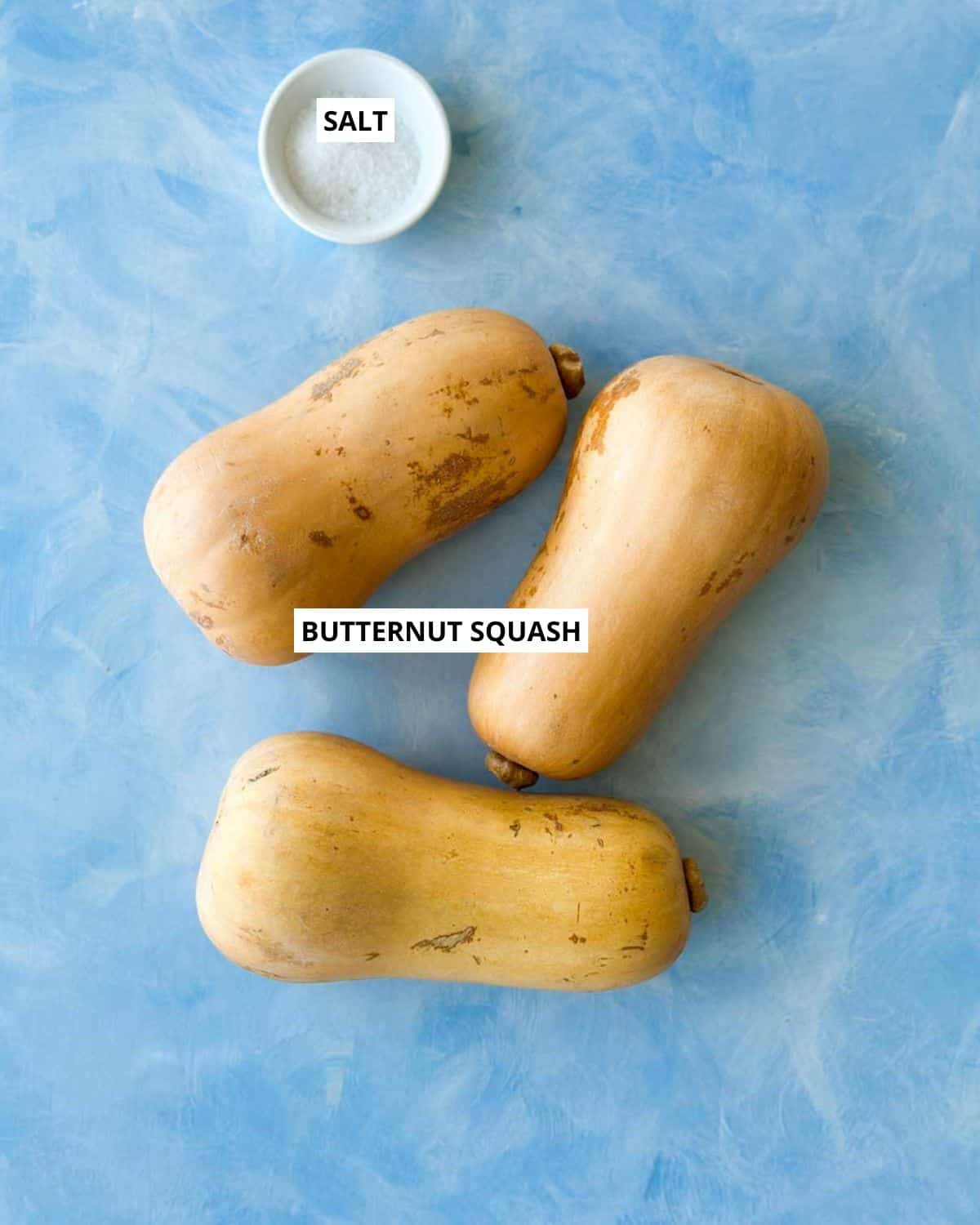 Labeled whole roasted butternut ingredients: butternut squash and salt.
